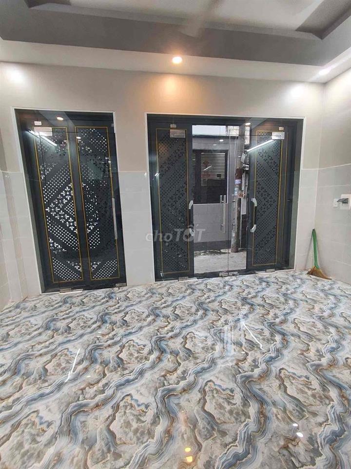 Bán nhà 3 lầu 4 pn mới xắy100% mới hẻm chợ nhi thiên đường p5 Q8