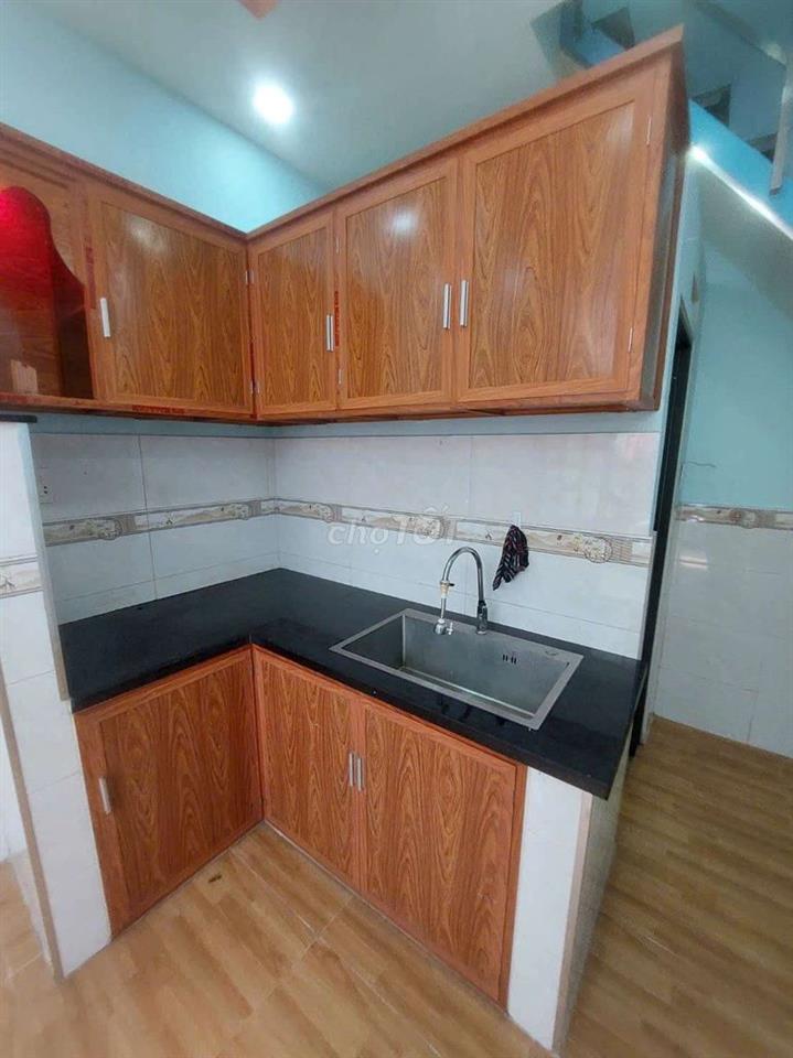 Bán nhà đường Quốc Lộ 50 DT.4m×5m } 1 Lầu 2 Phòng 1 toilet hẽm 3m.