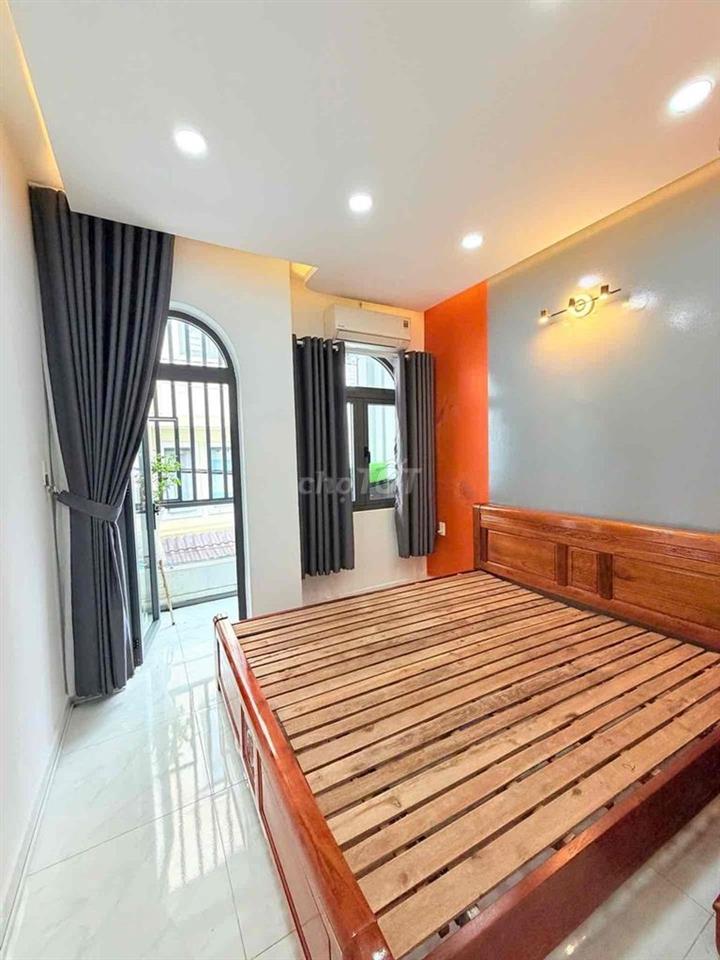 NHÀ HẺM XE HƠI 2 MẶT TIỀN TÂN PHÚ KHU DAN CU AN NINH