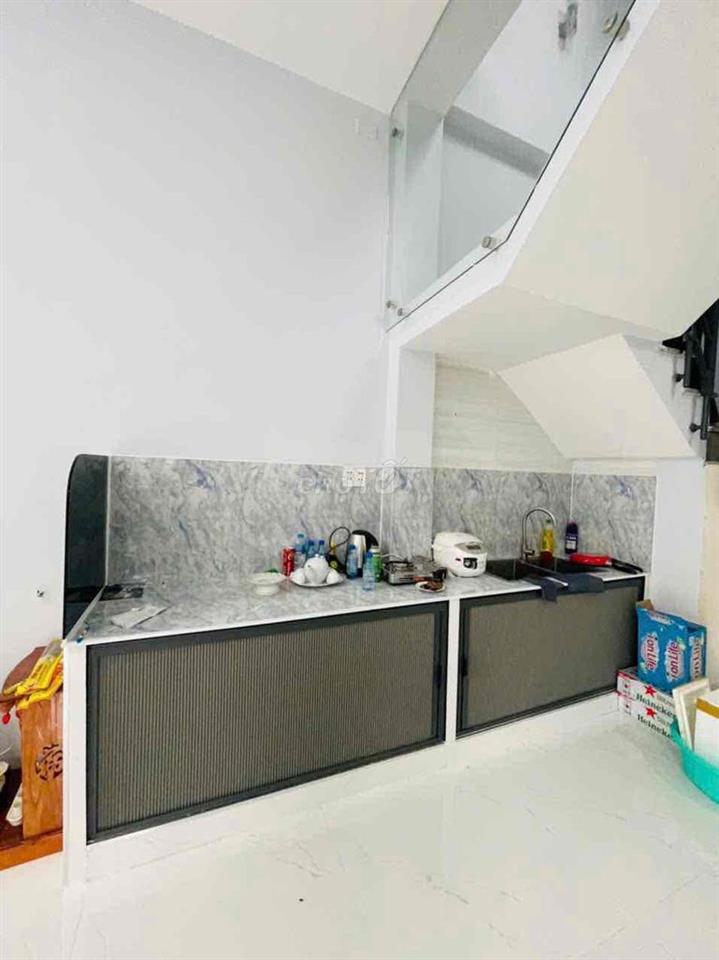 Nhà 1 trệt 2 lầu 70m2 mới xây gồm 4PN gần Đông Tăng Long Q.9