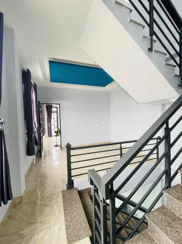 Nhà 1 trệt 2 lầu 70m2 mới xây gồm 4PN gần Đông Tăng Long Q.9
