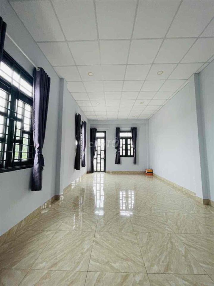 Nhà 1 trệt 2 lầu 70m2 mới xây gồm 4PN gần Đông Tăng Long Q.9