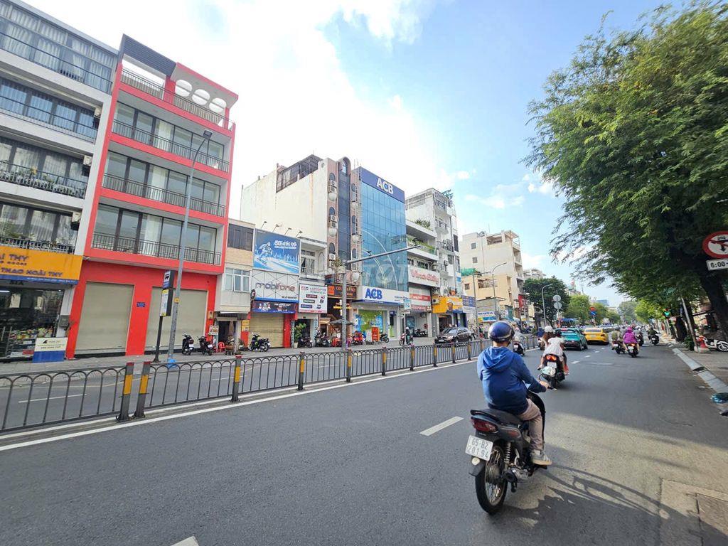 TÒA NHÀ MT LÊ VĂN DUYỆT Q. BÌNH THẠNH , DTSD : 700M2 NGANG 8M , 100TR