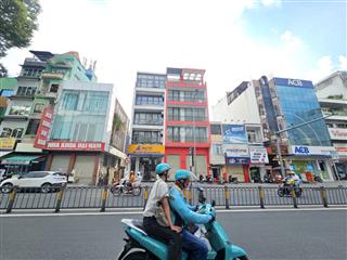 TÒA NHÀ MT LÊ VĂN DUYỆT Q. BÌNH THẠNH , DTSD : 700M2 NGANG 8M , 100TR
