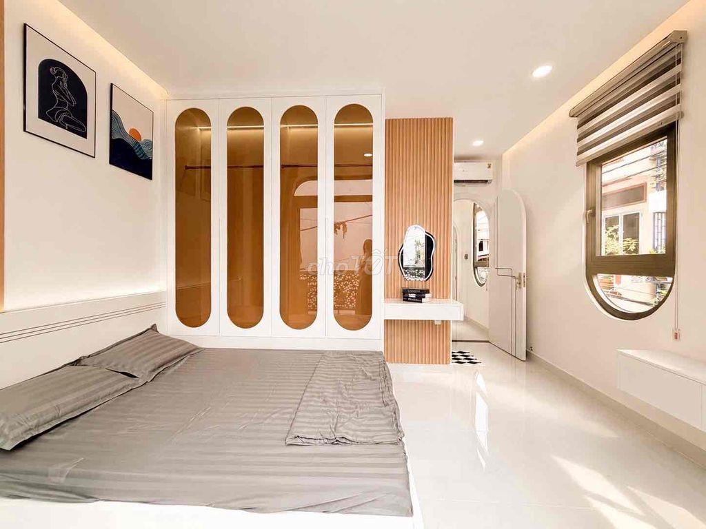 Nhà mới ngay công viên Gia Định, hẻm xe hơi, 2 tầng 3pn 3wc, 4m x 12m