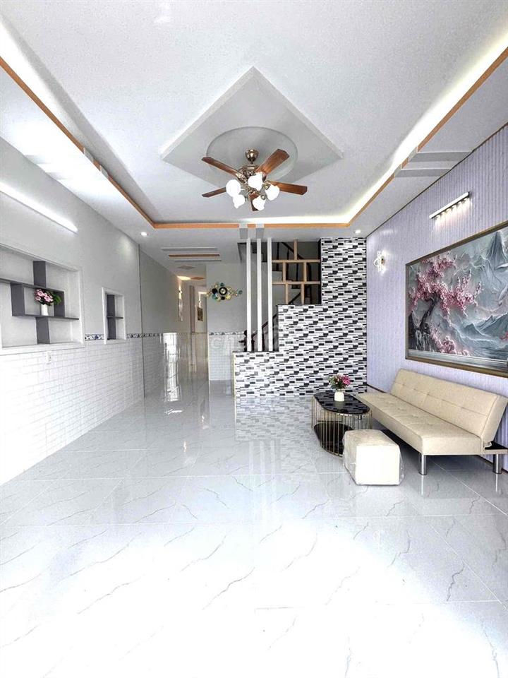 Nhà Lầu 100m2 SHR đường xe hoi cạnh Bến xe Hưng Long,