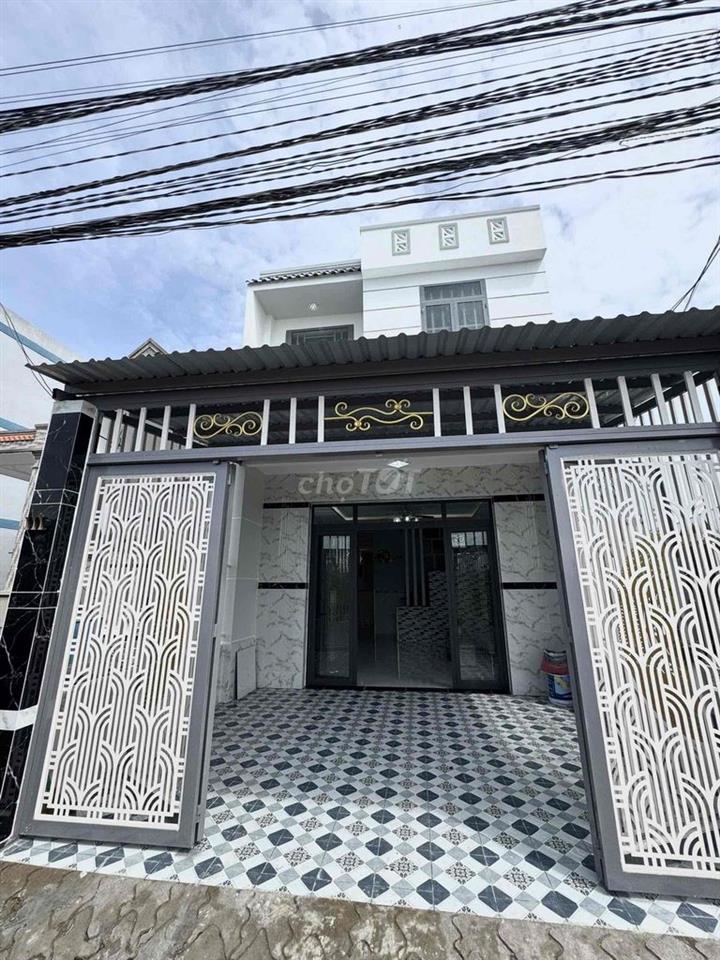 Nhà Lầu 100m2 SHR đường xe hoi cạnh Bến xe Hưng Long,