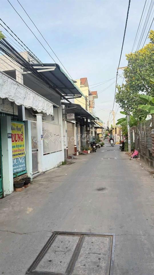 Cần bán nhà trệt lầu + 6 phòng trọ - Thu nhập 15tr/tháng