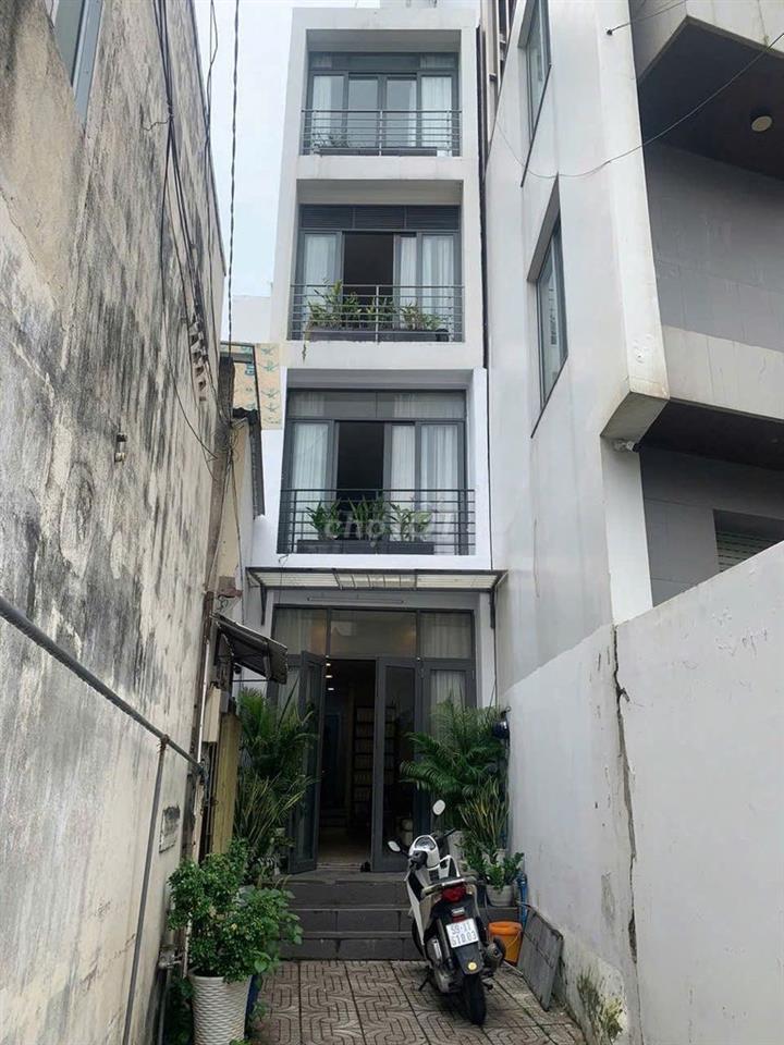 Nhà đẹp Nguyễn Hữu Cảnh 4x16m, 4PN, 3 lầu, có sân đỗ xe – 25tr/tháng