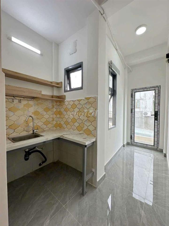 Nhà ở hoặc làm chdv Quận 4