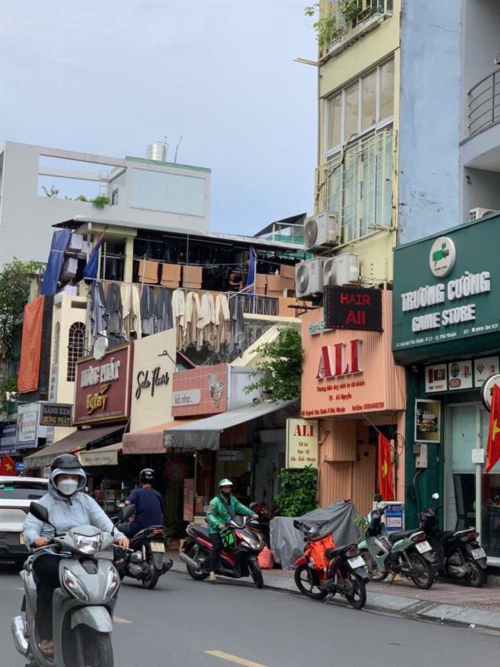 BÁN NHANH CĂN NHÀ MẶT TIỀN HUỲNH VĂN BÁNH 8 PHÒNG NGỦ