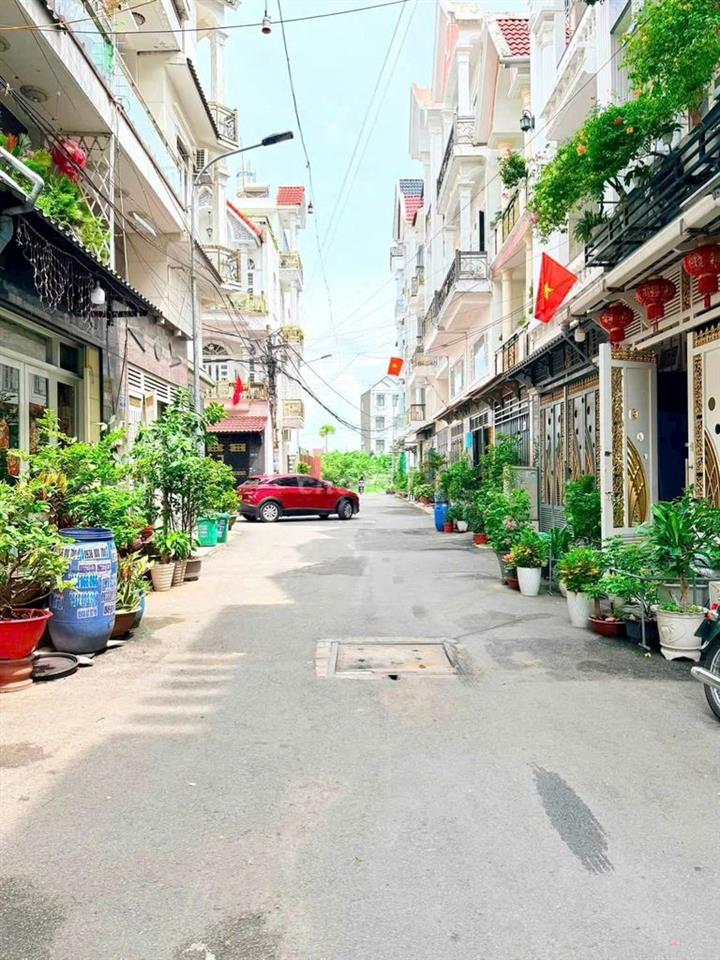 BÁN NHÀ 4 TẦNG - HẺM Ô TÔ - GẦN CHỢ HIỆP THÀNH Q12. GIÁ : 5,63 TỶ 