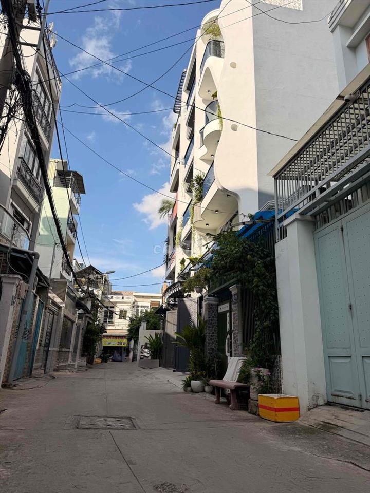 Khu Vip NVQ Quận 12, nhà mới 100%, 72.5m2, 5 tầng, hẻm xe hơi