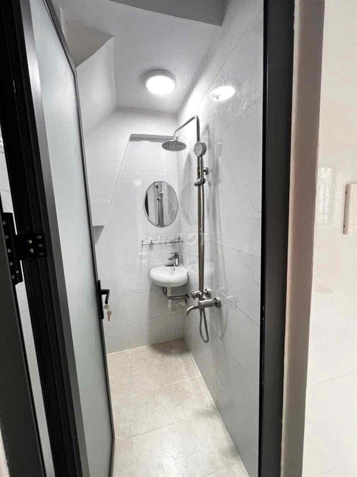 Cho thuê nhà ở và làm VP mặt hẻm cách Quang Trung 1 căn nhà