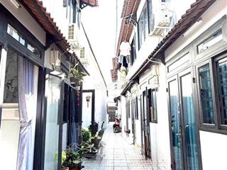 nhà mới sổ hoàn công đối diện trường đh nguyễn tất thành P.apđ Q12