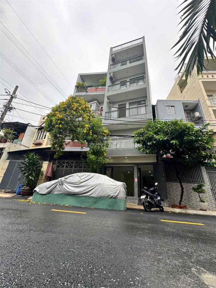 Giá 9.5 tỷ sở hửu ngay nhà 4 lầu mặt tiền nguyễn trường tộ tân phú