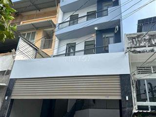 nhà mới xây 100% 2 mặt tiền trước sau đậu được 2 xe oto trong nhà