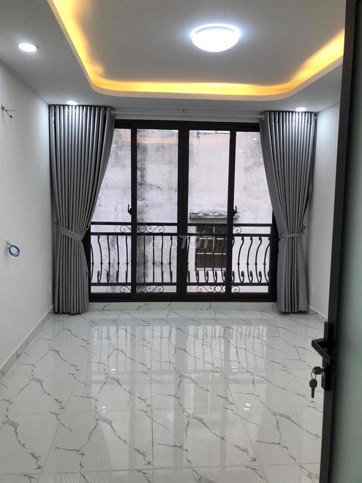 Bán Nhà 1T 3 Lầu 4X10 ,HXH 14/1 Đào Duy Từ