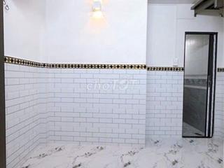 Bán nhà 2 tầng mặt tiền hẻm Tôn Đản, Quận 4