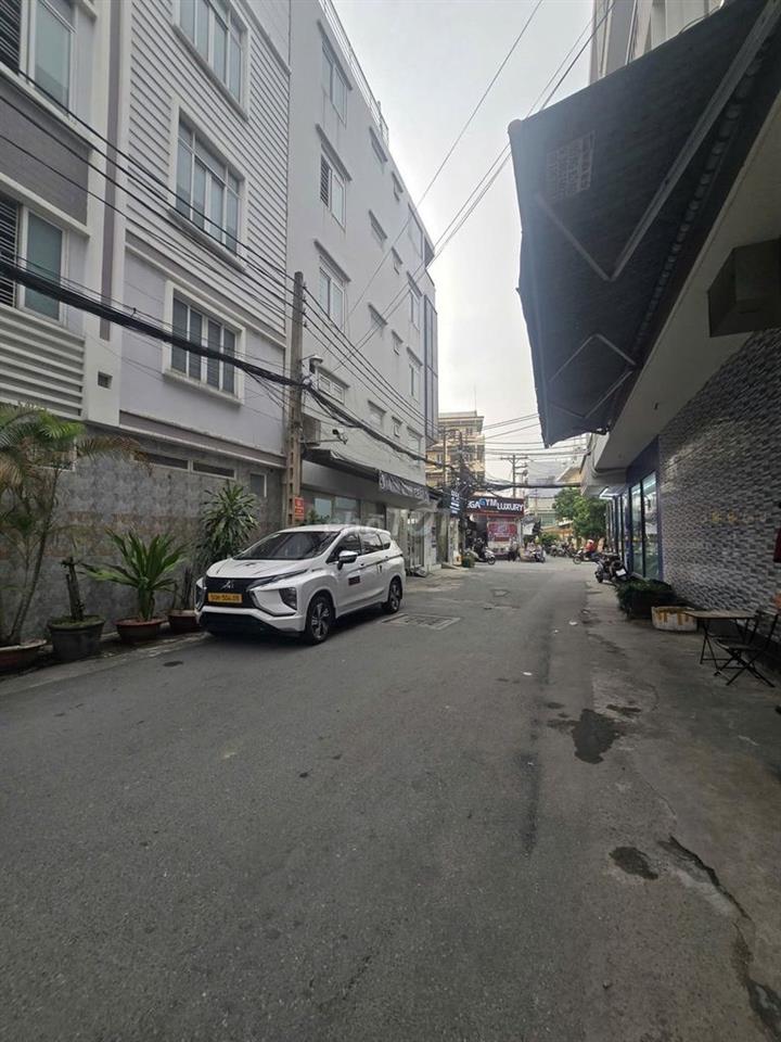 Nhà sát Nguyễn Thị Thập, Quận 7, xe hơi đỗ cửa, ngang 7m