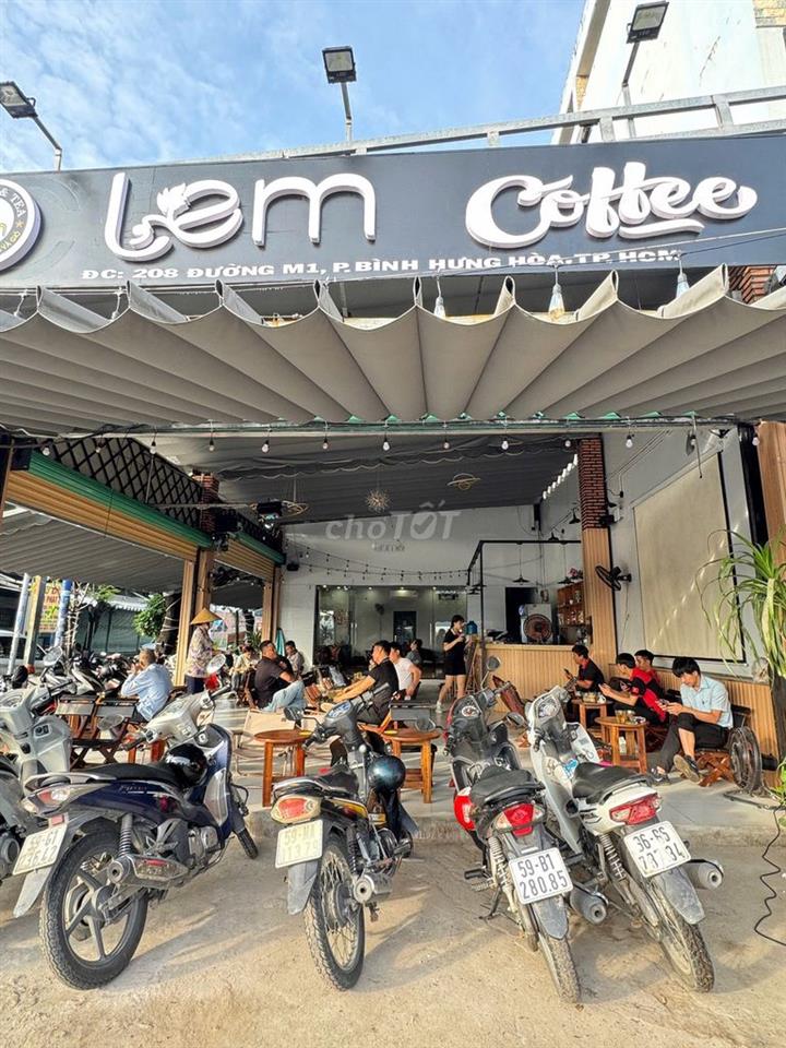 Sang quán cà phê