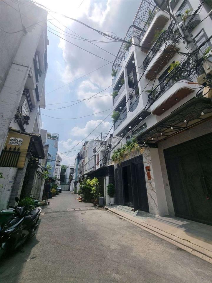 nhà,huỳnh văn nghệ phường12 gò vấp ,dt:4.5x 15 :xây dựng 4 lầu 5p ngủ