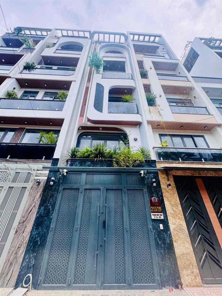 NHÀ  215/39 Phan Huy Ích chính chủ . 28 triệu /tháng có thang máy