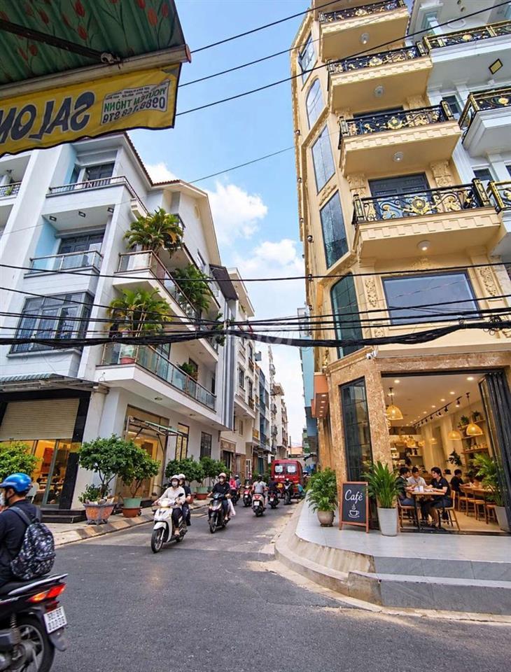 Tòa nhà Góc 2 mặt tiền 4 lầu, có thang máy