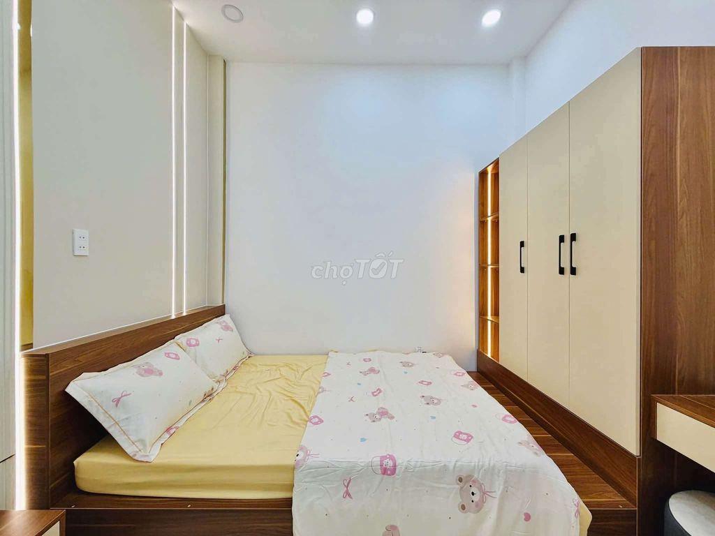 Nhà mới 100% full nội thất cao cấp dt 3x10m 1 lầu 2pn Quang Trung