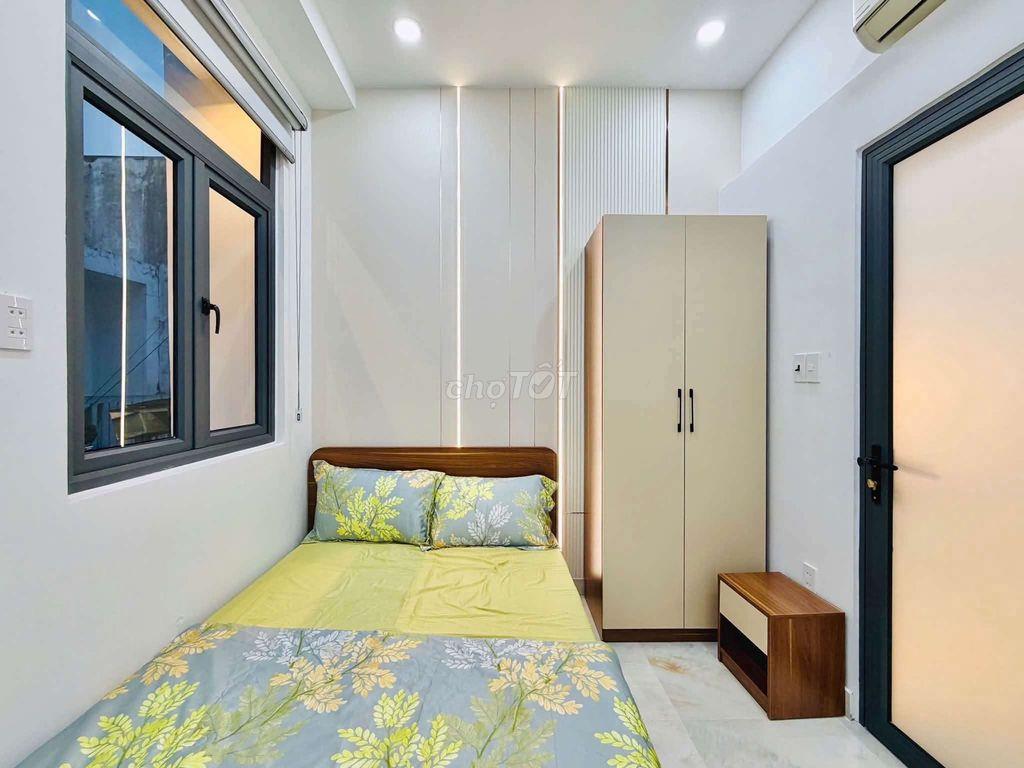 Nhà mới 100% full nội thất cao cấp dt 3x10m 1 lầu 2pn Quang Trung