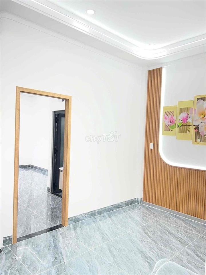 Nhà 1 trệt 1 lầu Cách ĐT 743 Nguyễn Văn Luông 200m đường ô tô7m