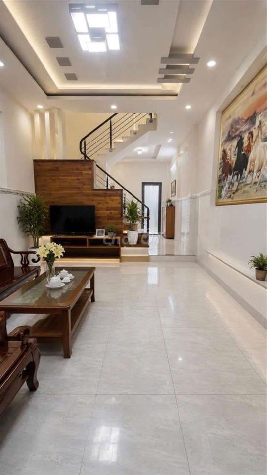 Bán nhà mặt tiền Nguyễn Thị Minh Khai, P. Dĩ An, 1 trệt 2 lầu, KD 
