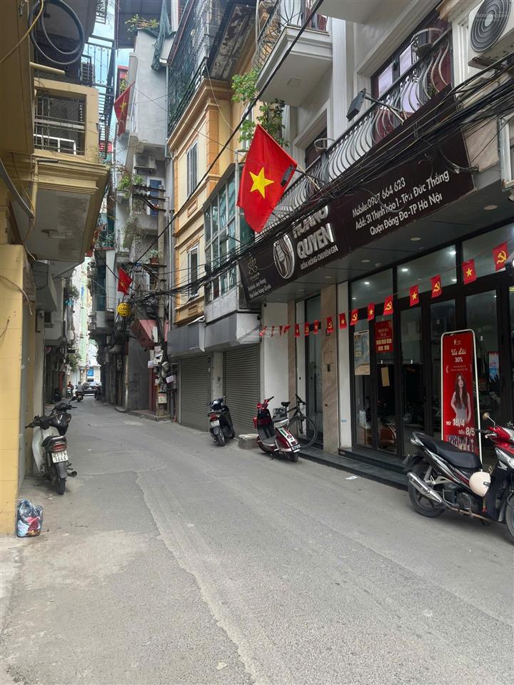 Chính chủ bán nhà đất mặt ngõ thịnh hào 1, 5 tầng+1 tum, mới xây có thang máy, ô tô đỗ  trước cửa