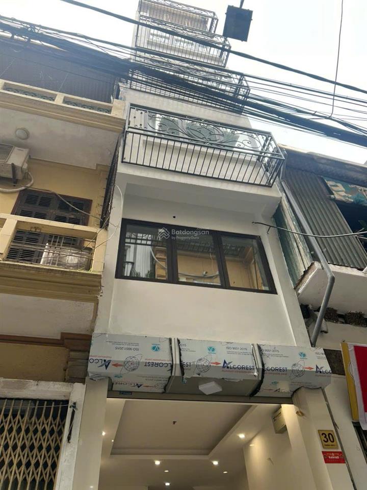 Chính chủ bán nhà đất mặt ngõ thịnh hào 1, 5 tầng+1 tum, mới xây có thang máy, ô tô đỗ  trước cửa