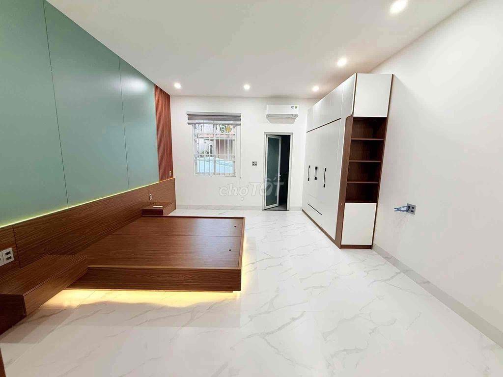 BÁN NHÀ 2 TẦNG MỚI ĐẸP MẠC ĐĨNH CHI - CÓ GARA ĐẬU Ô TÔ TRONG NHÀ!