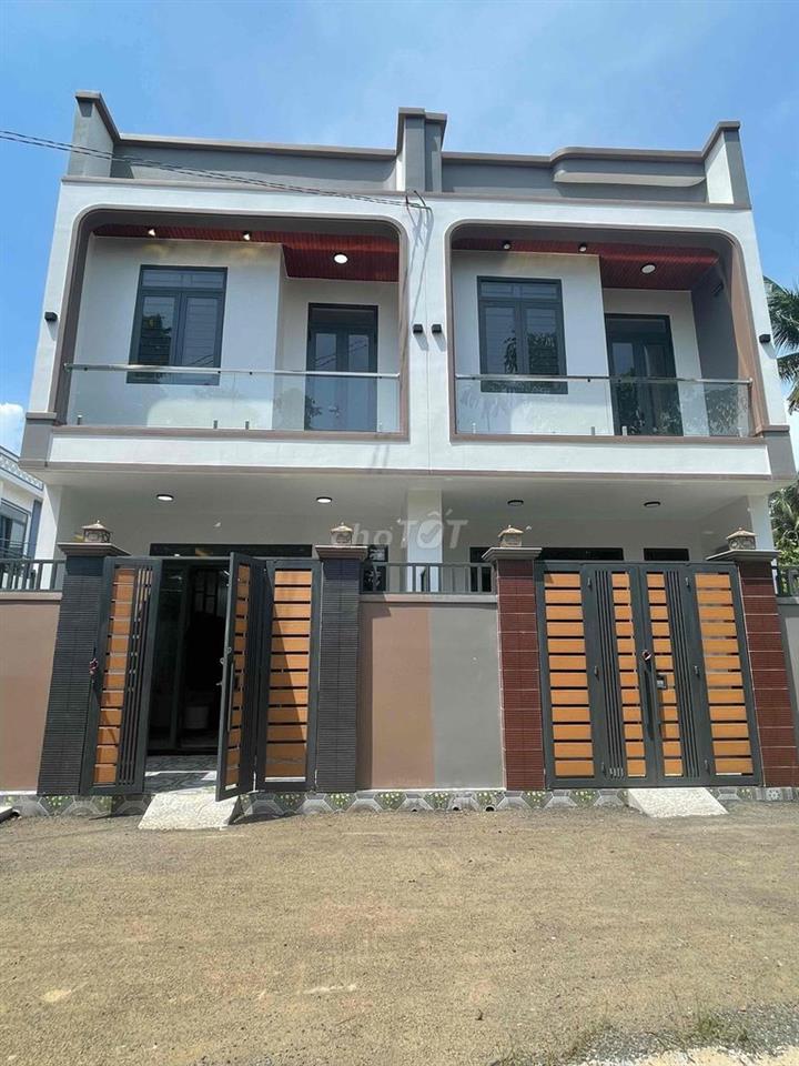 BÁN NHÀ 1 TRỆT 1 LẦU NGAY CHỢ ĐỒN