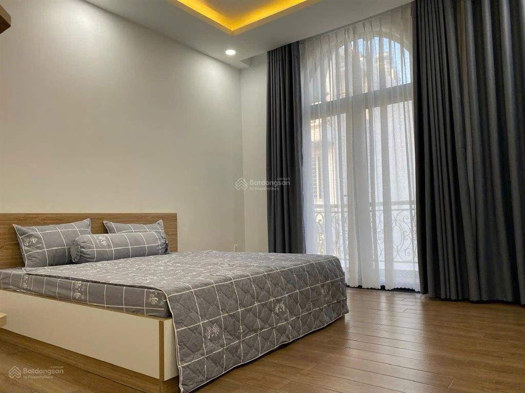 Bán nhà 4x14m 4tầng 4pn  hẻm oto đường lê trọng tấn.