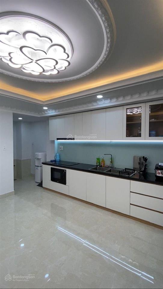 Bán nhà 4x14m 4tầng 4pn  hẻm oto đường lê trọng tấn.
