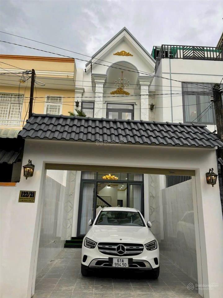 Cho thuê nhà 1 trệt 1 lầu 4 phòng ngủ full nội thất sân ô tô 7 chỗ p. hiệp thành