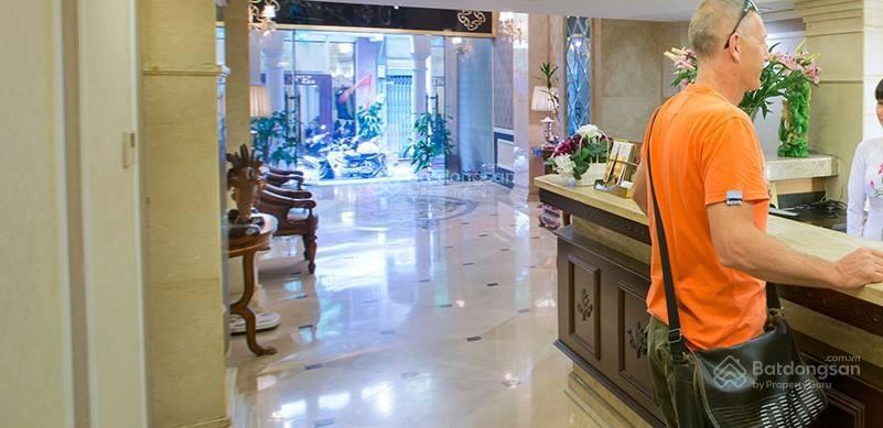 Khách sạn mặt phố sát chợ hàng da đường thành sổ 75m2 xây 7 tầng mt 4.8m 67,5 tỷ