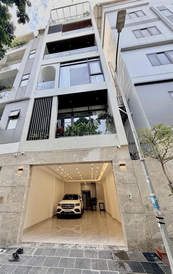 Đáng mua 75m2 mt 5m vỉa hè 02 bên 7 tầng thang máy nội thất tinh xảo gara 02 ô tô 7 chỗ