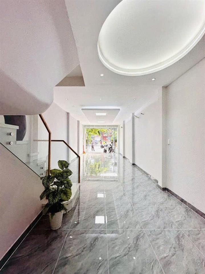 Bán nhà Mặt tiền Dương Quảng Hàm - giao Nguyễn Thái Sơn, 4x14m, 4 Tầng,  chỉ 16,7 Tỷ.