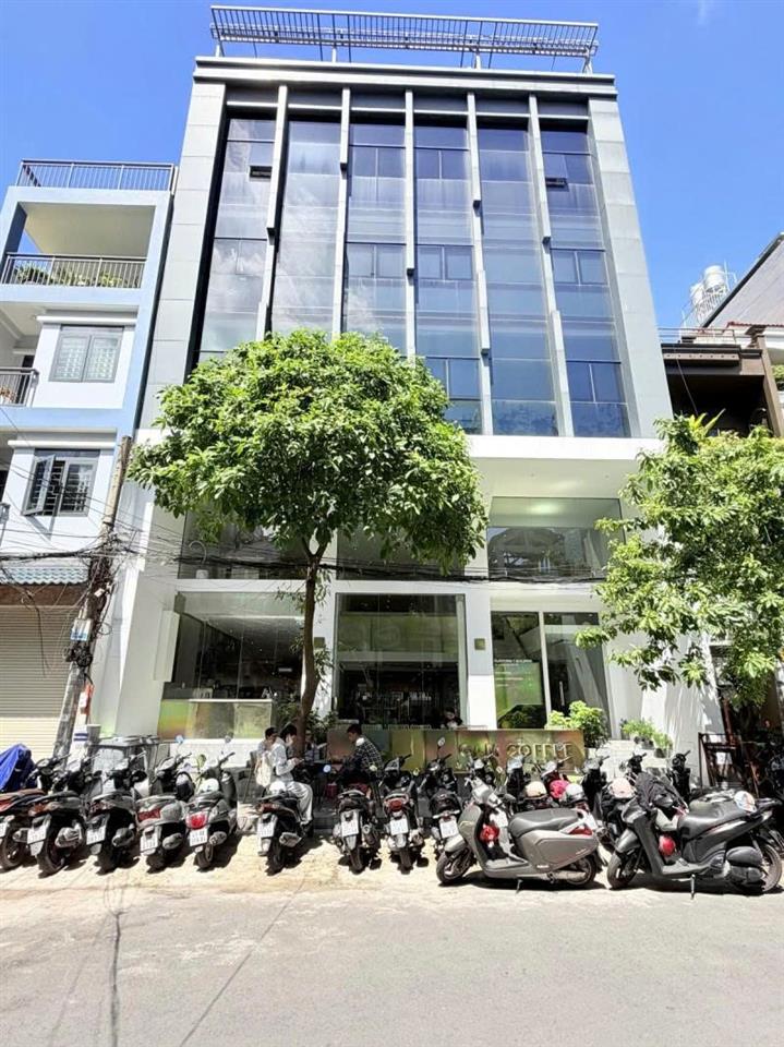 Bán Nhà 7 Tâng  - Mặt tiền Hẻm 12m Nguyễn Gia Trí, 12x20m, Dòng tiền 300 triệu, 89,9 Tỷ.