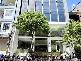 Bán Nhà 7 Tâng  - Mặt tiền Hẻm 12m Nguyễn Gia Trí, 12x20m, Dòng tiền 300 triệu, 89,9 Tỷ.