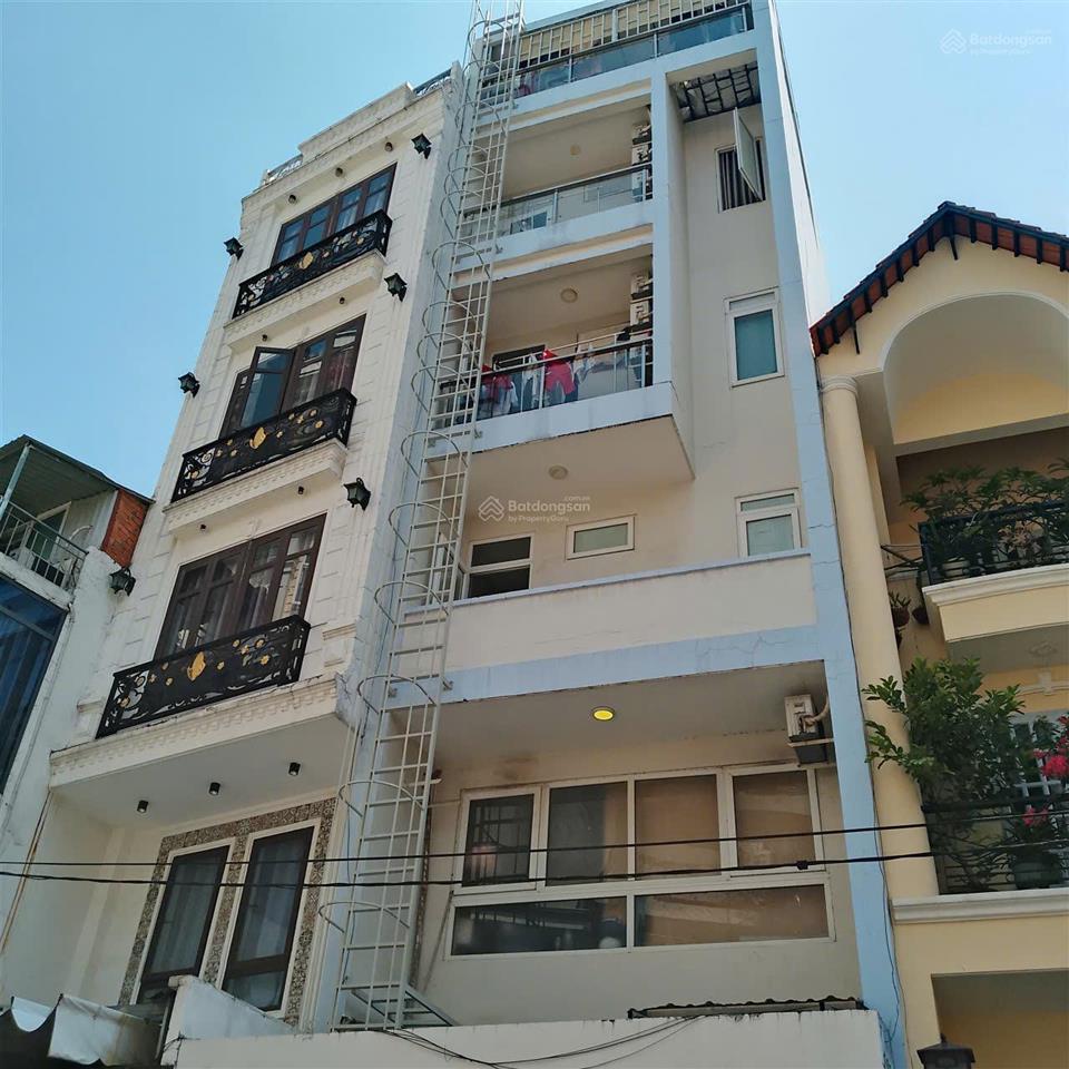 Toà nhà 7 tầng đường phổ quang (5mx24m. nở hậu 6,5m). giá 29 tỷ