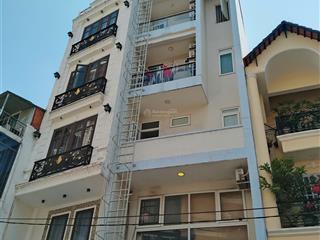Toà nhà 7 tầng đường phổ quang (5mx24m. nở hậu 6,5m). giá 29 tỷ