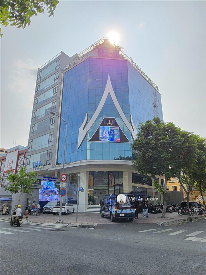 Tòa nhà góc 2 mặt tiền nguyễn trãi quận 1 ngang 30m hiếm 2 hầm 10 tầng mới 100% dòng tiền 913,43tr