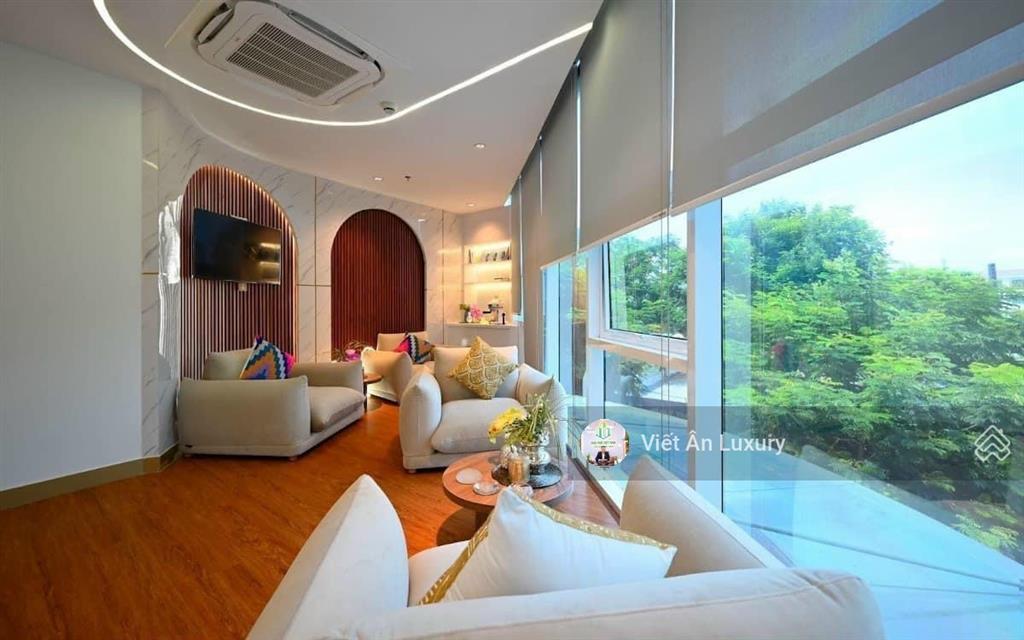 Tòa nhà góc 2 mặt tiền nguyễn trãi quận 1 ngang 30m hiếm 2 hầm 10 tầng mới 100% dòng tiền 913,43tr