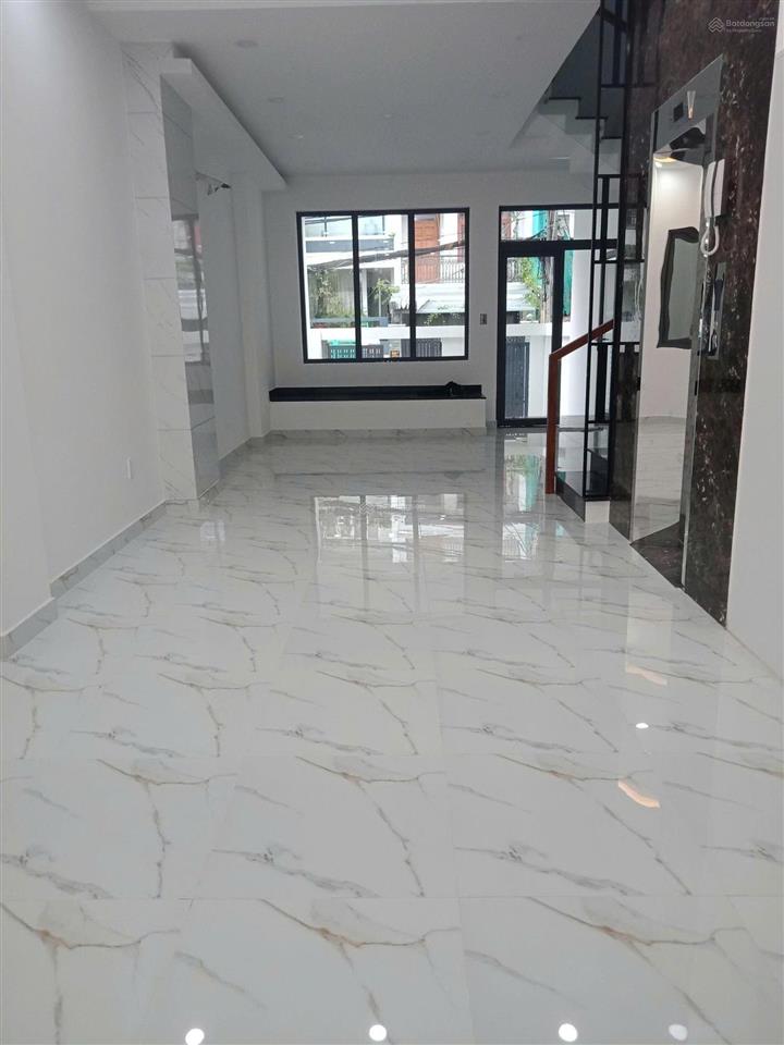Nhà 5x20m xây 6 tầng 1 hầm 1 trệt 3 lầu st 6pn 8wc đường số tân quy