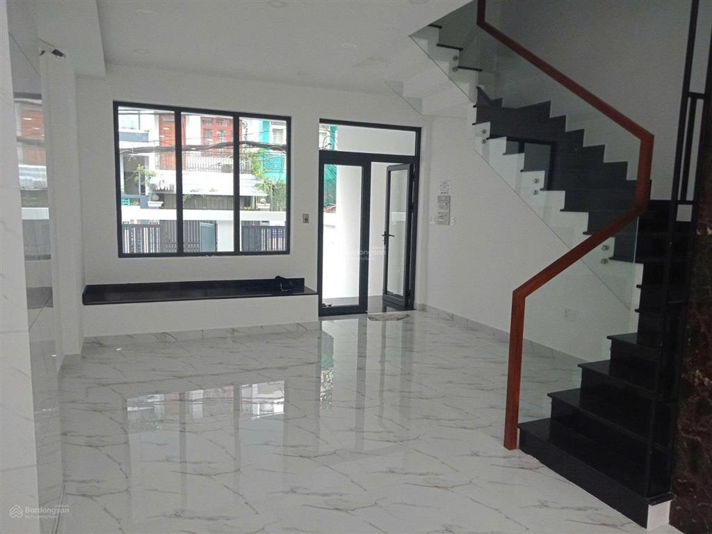 Nhà 5x20m xây 6 tầng 1 hầm 1 trệt 3 lầu st 6pn 8wc đường số tân quy